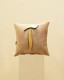 A plush cushion introduces warmth and style to this sophisticated living room, made in Lahore.