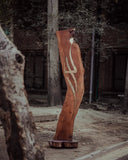 Detailed wooden sculpture showcasing fine craftsmanship, perfect as a unique decor piece for home or office.