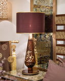A stylish lamp brightens this elegant living room, enhancing its sophisticated look with clean design and soft lighting.