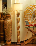 A vibrant uplighter lamp brightens any room, showcasing intricate designs. Handmade in Lahore to enhance your living space’s charm and warmth.