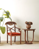 Elegant chair set with cushions enhancing your living space, crafted with fine detail for comfort and style.