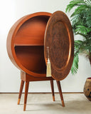 This chest combines practical storage with refined design, enhancing the room’s warm and inviting atmosphere.