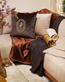 Stylish embroidered cushion showcasing traditional designs, perfect for elevating your living or drawing room ambiance.