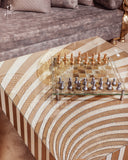 The glass chess board and stylish frame combine to create a functional and beautiful centerpiece for your home or office.