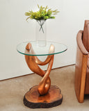 A beautifully crafted table brings warmth and sophistication to this elegant living room.