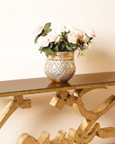 A detailed close-up of the console table, highlighting its smooth surface and refined finish.