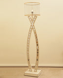 A modern uplighter softly illuminates a refined living room, adding ambient light and elegance, made in Lahore.