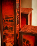 Close-up of floor lamp showing detailed craftsmanship and soft light, handmade in Lahore.