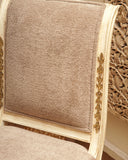 Close-up of the chair’s textured upholstery, highlighting the comfort and craftsmanship in the seating arrangement.