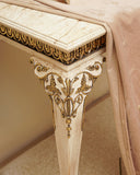 Close-up of a curated console setup featuring an artful frame, enhancing the room’s refined aesthetic with minimalist decor.