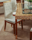 Close-up of a dining chair with smooth finish and clean design, offering both comfort and style.