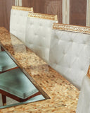 Detailed shot of the dining table showcasing refined textures and durable materials.