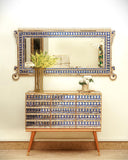 Decorative chest with intricate designs, perfect for stylish storage and enhancing home decor.