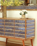 Elegant chest featuring detailed patterns, adding charm and function to any living space.
