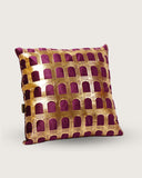 Handmade printed cushion with intricate designs enhances the style of a cozy living space.