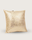 Bright printed pattern cushion brings warmth and personality to a sophisticated living room.