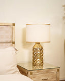 A beautifully designed lamp adds a warm glow and elegant touch to any room, enhancing its style and ambiance.