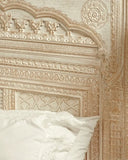 Detailed view of Rivaj Bed Set headboard texture with neatly arranged pillows.