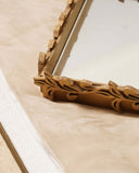 Close-up of the Rubber Mirror Tray showcasing its smooth reflective surface and detailed handcrafted edges, highlighting artisanal decor from Lahore, Pakistan.