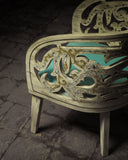 Elegant chair with matching side table, creating a cozy and inviting corner for relaxation or work.