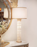 A sleek silver lamp adds a modern touch to any living room, enhancing the space with style and light. Perfect for contemporary interiors.