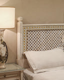 Close-up of the bed set’s detailed upholstery and soft textures, offering a glimpse into the refined aesthetic and comfort it brings to a modern bedroom.
