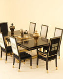 Taurus Dining set displayed in a sophisticated setting, showcasing the craftsmanship of handmade furniture from Lahore, Pakistan.