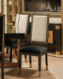The Taurus Dining Set features elegantly crafted chairs that showcase the intricate detailing and expert craftsmanship of handmade furniture from Lahore, Pakistan.