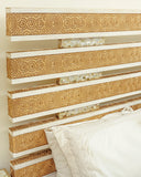 Close-up of the bed set showing smooth and detailed design of the headboard.