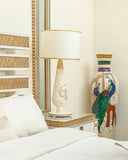 Soft-glow lamp beside zaviya bed set creating a calm, cozy bedroom atmosphere.