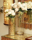 Close-up of flower vases and tray accessories on dresser complementing zaviya bed set.
