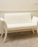 Stylish settee enhancing modern living room decor with sleek design, perfect for adding elegance and comfort to any contemporary home space.