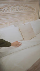Video showcasing Rivaj Bed Set in a styled bedroom with warm lighting and cozy layers.