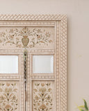 Close-up of antique door wall hanging showing detailed patterns and textures, handmade in Lahore.

