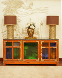 A stylish sideboard adds elegant storage and enhances the décor of this sophisticated living room, handmade in Lahore.

