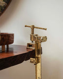 A close-up of the clamp console highlights its sleek design and refined craftsmanship, bringing a sense of modern elegance to the space