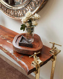 A close-up of the clamp console styled with carefully chosen accessories showcases its modern design and attention to detail, adding depth and character to the living space.