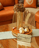 Sofa set ensemble with elegant furniture and accessories, offering warmth, function, and visual harmony.

