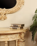 Close-up of detailed design on the console and frame, showcasing fine craftsmanship in this stylish living area.

