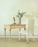 Full view of a timeless desk setup, creating a warm and functional workspace atmosphere.