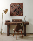 A classic writing desk adds elegance and functionality to this sophisticated living room, handmade in Lahore.

