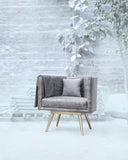 A stylish accent chair in a cozy living room, enhancing the space with its clean lines and comfortable design.