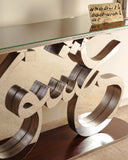 A close-up of the console’s surface, highlighting its smooth finish and contemporary aesthetic.

