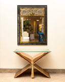 kitab console paired up with golden mosaic frame 