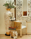 An inviting living room showcases the Meridian Chair, a handcrafted statement from Lahore.

