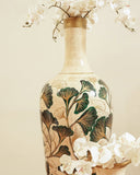 Close-up of a detailed terracotta set showcasing its rich texture and earthy tones.

