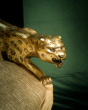 Close-up of the Panther chair’s detailed sculpture. 

