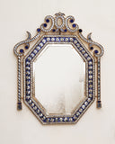 Elegant Raj mosaic frame, handmade in Lahore, adding vibrant patterns and color to a sophisticated living room.

