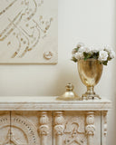 A close-up view of the accessory on the sideboard reveals its refined craftsmanship and adds a subtle touch of elegance to the overall décor.