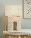 A detailed look at the lamp perched on the sideboard, adding a soft, stylish ambiance.